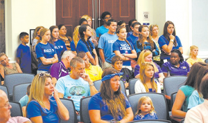 Kaely Camacho’s family members and other supporters are pictured at the meeting.