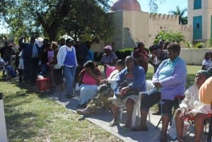 pa-locka Residents, with chairs and blankets, began forming a line in the parking lot of Historic City Hall before 7 AM for the Annual Turkey Give-Away.