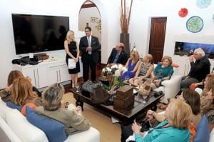 Marile and Jorge Luis Lopez (standing) introduce the Laureate Society to prospective donors.