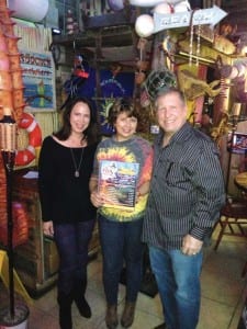 Angela Rivera (center) from the Fish House on Miller Road, shares her great menu with Seida and Horace Feliu