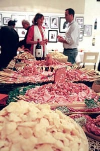 Spread of assorted hams and cheeses.