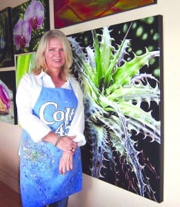 Artist expresses her love of bromeliads on canvas