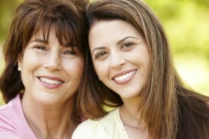 Portrait Hispanic mother and adult daughter