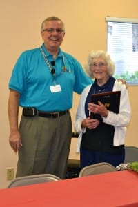 Robert Hohenstein, President & CEO of The Miami-Dade County Fair & Exposition, with Ms. Sudie Grow, who retires at the age of 93 after working at the Youth Fair for 38 years.