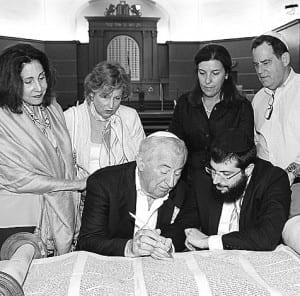 Beth David Congregation members celebrate Torah restoration event