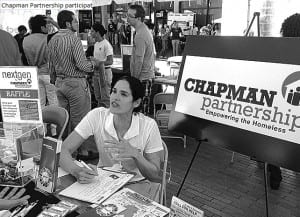 Pictured is Grace Ugalde-Wolpert, Community Outreach manager, at the Chapman Partnership booth during the second