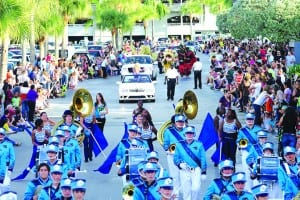 The parade features marching bands, clowns, vintage cars, costumed characters, along with the season’s first official appearance of Santa.