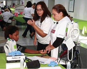 Youngster undergoes medical testing during recent National Health Week activities.