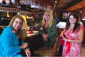 Nancy Concepcion and Maria Martinez are pictured with Cristy Martinez-Paez, of the American Heart Association, during Seasons 52 event for charity