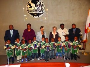 The City Commission recognized each Super Pee Wee Football Team player for their win and bringing home the championship trophy. (Pictured from Left to Right): Commissioner Thomas Dorsett, Vice Mayor Felicia M. Brunson, Commissioner Rita Mack, and Commissioner Sharon Fyffe, and Mr. Cesar Garcia, Parks and Recreation Superintendent. 