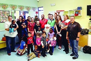 Speedway staff members visit children at local care facilities