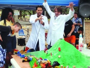 Roxy Theater's Charles Sothers and Ivan Lopez demonstrate a volcano explosion