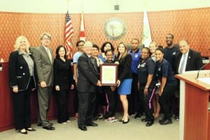 L to R Rear: Commissioners Jennifer Levin, George “Bud” Scholl, Jeanette Gatto, Coach Kantzhia Thomas, Inna Kartunova, Marie Napolitano, Lester Alexander, Christine Carney, Coach Daniel Stephenson, Vice Mayor Isaac Aelion. L to R Front: Mayor Norman S. Edelcup, Coach Brianna Sepersaude, Cultural & Community Services Director Susan Simpson, Coach Brittney Crawford, Coach Val Butler.