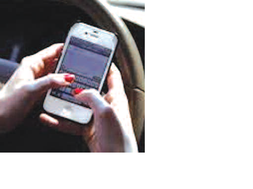 Wireless companies send mixed signals on texting and driving