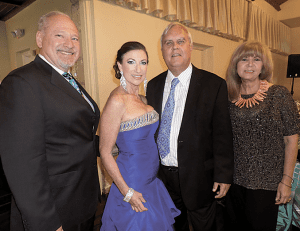 Pictured at CGWC President’s Reception/Dinner are immediate past president and honoree Mireya Kilmon with husband, Stephen Kilmon; Gables Mayor Jim Cason and his wife, Carmen.