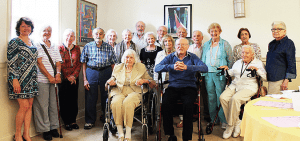 Pictured is Mayor Cindy Lerner (l) with many of the Village seniors who attended her annual Pinecrest Pioneers summer luncheon.