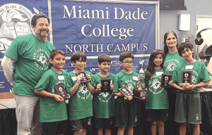 Members of the Primary team include Josie Van Hemert, parent; students Mario Solorzano, Ryan Hidalgo, Nico Gaunaurd, Hely Santeliz, Carolina De La Vega and Carlos Jesus Morales, and their teacher Eileen del Cueto.