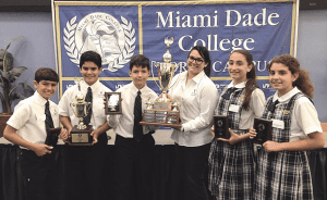 Members of the Middle School team include Manuel Gaunaurd, Jesus Javier Rodriguez, Marcel Van Hemert, Dibe Marie Di Gregorio and Luciana Solórzano, and their teacher Ana Centurion.