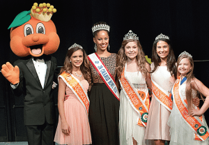 Pictured (l-r) are Junior Orange Bowl mascot Jobie, Princess Isabella Morales, Miss Junior Orange Bowl Luisaura Alvarez, Queen Emma Gillian, Princess Rebekah Gadea and Little Sister Gwendolyn Odion.