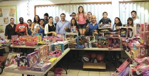 Children and families at Mount Olive Missionary Baptist Church enjoyed the toys the SoMi Fitness team collected and donated last year.