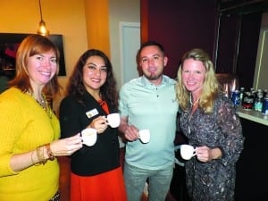 Junior Orange Bowl members enjoy visiting after their Jan. meeting at V Café, a new place located on Ponce and University in Coral Gables. Seen here are Kathleen Kauffman, JOBC President-Elect: Jessica Cerda, JOBC Executive Director; V Café owner, Michael Belaustegui; and Samantha Jones, JOBC Vice President.