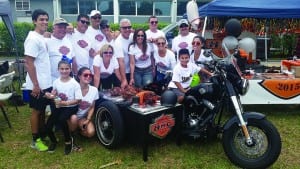 St. Brendan High community ‘pigs’ out at Sabre Cook Off