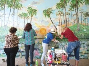 Artist's pine rockland mural gets added resident touches