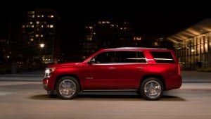 2015-Chevy-Tahoe-red-side-veiw