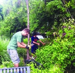 Wall painting, park cleanup help to beautify West End