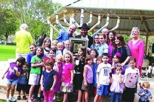 Village residents gather to celebrate Hanukkah