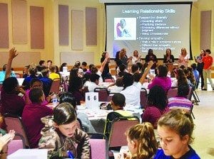 Elementary school students learn about cyber- bullying