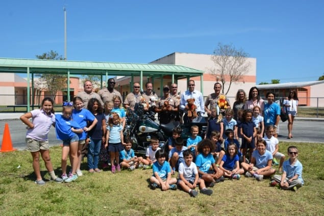 Village students help youngsters with donation of stuffed animals