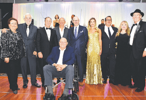 Gala Picture: Sherry Kaplan Roberts, Stu Blumberg, Michael S. Goldberg, David Edelstein, Jonathan Plutzik, Erica Rakow, Pierluigi Gazzolo, Robin Jacobs and Jerry Libbin. Stanley Whitman (seated)