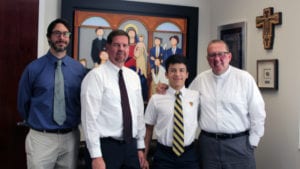 Assistant Principal Ramon C. Nicosia, Principal Jose E. Roca, National Merit Semifinalist Esteban Guio, and School President Jesuit Father Fr. Guillermo M. García-Tuñón.