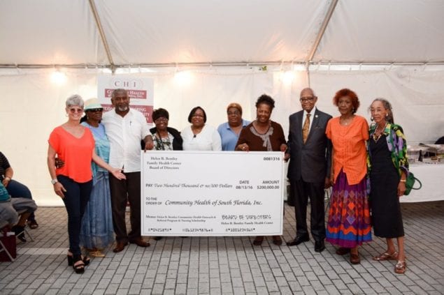 CHI receives $200,000 check during partnership celebration
