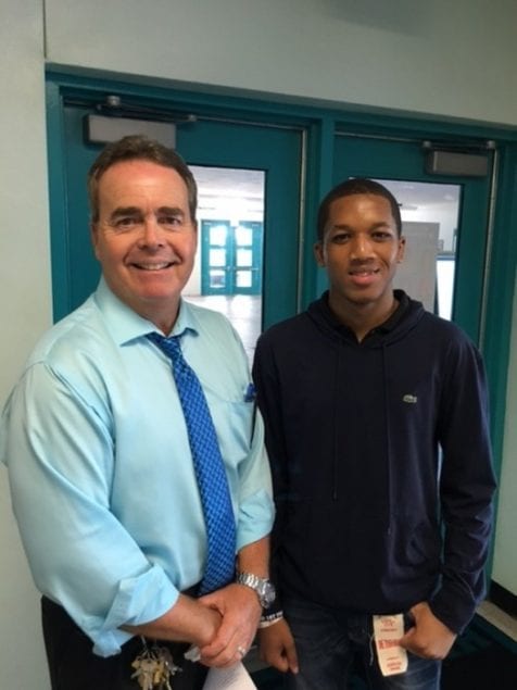 Rahsaan Williams, a senior in the Business and Finance Academy at Coral Reef High School (CRHS), was part of the 2016 Summer Youth Internship Program’s Millennium Access Platform presentation on Aug. 3. The presentation occurred during the Miami-Dade County School Board's Academics, Evaluation and Technology Committee meeting. Pictured are Thomas Ennis, CRHS principal, and Rahsaan Williams.