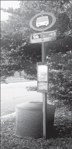 Bus stop at SW 47 Street and 157 Avenue has the barest of components – a pole and a trash can.