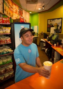 Nicholas Espinosa, a Panther LIFE student, learns the ins and outs of working and keeping a job during a job shadowing opportunity at the Rec Center’s Tropical Smoothie Café.