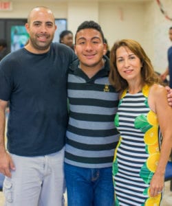 Nicholas Espinosa (center) got a taste of “the boring life” during his stay at an on-campus dorm.