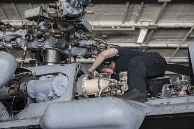 Miami sailor works on U.S. Navy aircraft