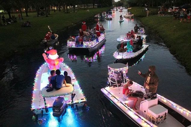 Though rain-hampered, boat parade still sparkles