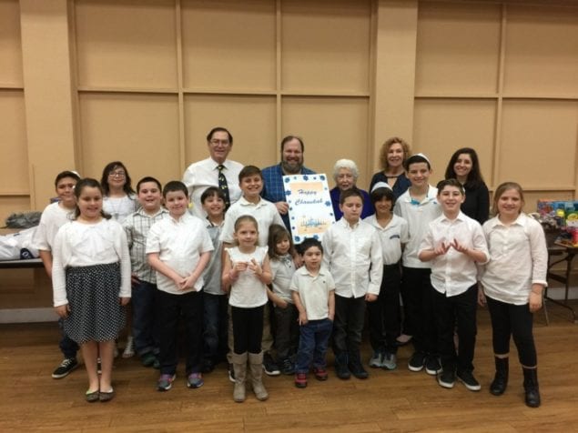 Congregation Dor Chadash donates funds and toys to JCS Shalom Bayit