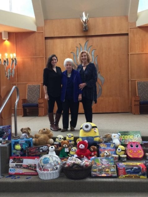 Congregation Dor Chadash donates funds and toys to JCS Shalom Bayit