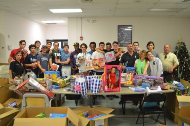 Gulliver Prep’s baseball teams participates in collection of toys