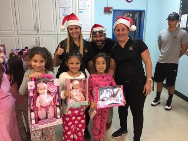 Planet Fitness spreads holiday cheer at Boys and Girls Club