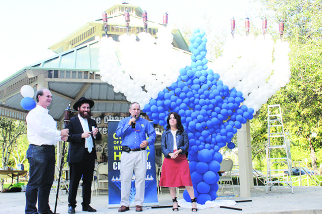 Palmetto Bay Community celebrates Hanukkah with huge balloon menorah