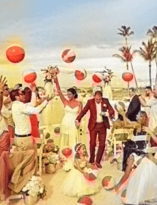 Beach balls are tossed in lieu of rice to celebrate a wedding at Hawks Cay Resort & Marina on Duck Key near Marathon