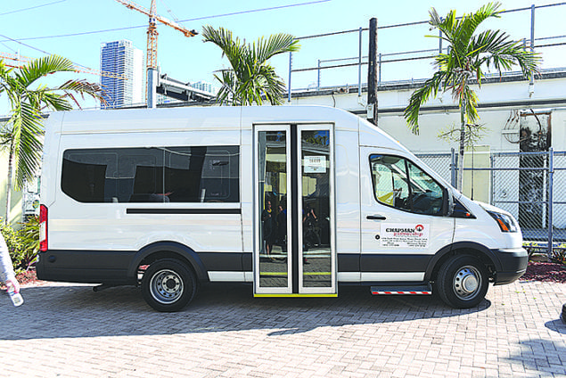 Chapman Partnership receives new van to transport seniors, disabled