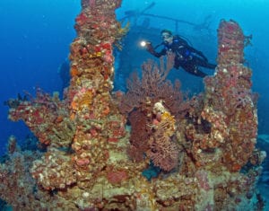 Annette Robertson explores a portion of the artificial reef  Spiegel Grove Wednesday, May 16, 2012, in the Florida Keys National Marine Sanctuary, off Key Largo, Fla. Thursday, May 17, marks the 10th anniversary of the former 510-foot, U.S. Navy landing ship dock's scuttling to become an artificial reef. FOR EDITORIAL USE ONLY (Stephen Frink/Florida Keys News Bureau/HO)