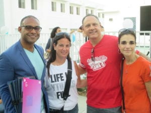 Héctor L. Silva, Jr., Founder of Project Harmony, Diane Gleit, PTSA President, Luis Bello, Principal of Aventura Waterways K-8 Center and Nira Benbassat